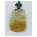 Elegant Hand-Carved Jade Pendant