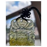 Elegant Hand-Carved Jade Pendant