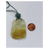 Elegant Hand-Carved Jade Pendant