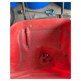 Earthway spreader and garden hose