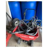 Earthway spreader and garden hose