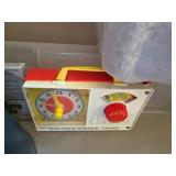 Collection of Vintage Toys including Playskool Bricks, Dolls, and Fisher Price Clock