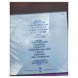 Collection of 4 Beatles Vinyl Records