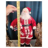 Christmas Decor Collection Including Santa Figures and Holiday Arrangements