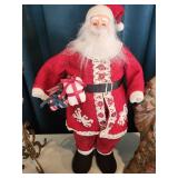 Christmas Decor Collection Including Santa Figures and Holiday Arrangements