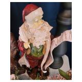 Christmas Decor Collection Including Santa Figures and Holiday Arrangements