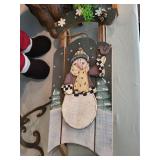 Christmas Decor Collection Including Santa Figures and Holiday Arrangements