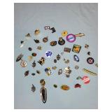 Collection of Vintage Lapel Pins, Badges, and Brooches