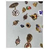 Collection of Vintage Lapel Pins, Badges, and Brooches