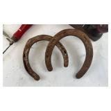 Collection of Vintage Hand Tools Including Wood Plane, Horseshoes, & Vintage Twilit Cast Iron Single Hole Paper Drill (Yellow level NOT Included!)