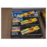 Assorted Pinewood Derby Cars and Accessories