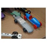 Assorted Pinewood Derby Cars and Accessories