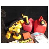 Tub of auto accessories, new tiedowns, chainsaw chain guard, Dewalt battery operated tools, and 2 gas cans