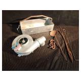 Metal tool box of antique foundry tools, blower with a new pulley