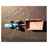 Metal toy tractor with an Ertyl trailer