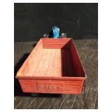 Metal toy tractor with an Ertyl trailer