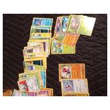 Pokémon tin filled with 100 Pokémon trading cards