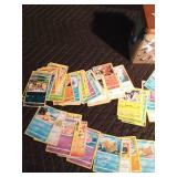 Pokémon tin filled with 100 Pokémon trading cards