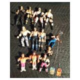 12 Wrestler figurines and 2 wrestler necklaces