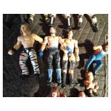 12 Wrestler figurines and 2 wrestler necklaces