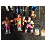 12 Wrestler figurines and 2 wrestler necklaces