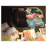 Pokémon tin of 100 Pokémon trading cards