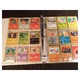 90 Pokémon cards in a binder