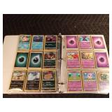90 Pokémon cards in a binder