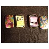 2 Pokemon tins of 50 pokemon trading cards each