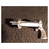 Pistol toilet paper holder