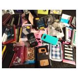 Lot of phone cases including an Otter and tablet covers