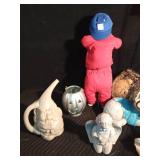 Lot of garden decor and gnome watering can