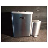 2 flip-top garbage cans