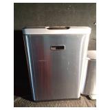 2 flip-top garbage cans