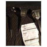 2 new and 4 used solar lights