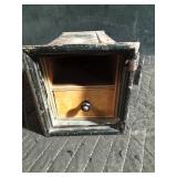 Vintage safety deposit box with wooden drawer