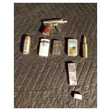 6 lighters and a tiny tin of Bon Juan razor blades