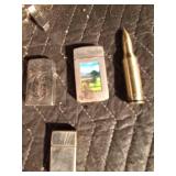 6 lighters and a tiny tin of Bon Juan razor blades