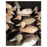 12 plastic duck decoys and blind netting