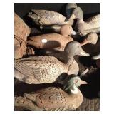 12 plastic duck decoys and blind netting