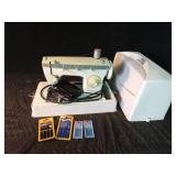 Singer sewing machine in case with some accessories