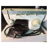 Singer sewing machine in case with some accessories