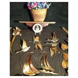 Metal wall decor, wood shelf and more