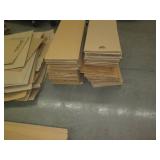 Stack of misc unassembled cardboard...