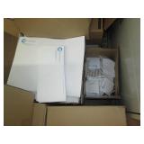 Pallet of shipping supplies and branded envelopes