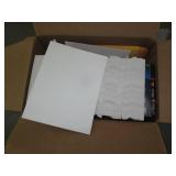 Pallet of envelopes, promotional items and a shipping paper dispenser