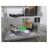 Contents of shelf filled with office supplies