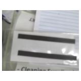 Contents of shelf filled with office supplies