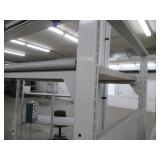 Industrial desk or shelf with a rolling office chair