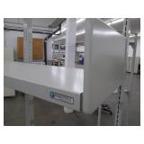 Commercial desk with shelving and a chair